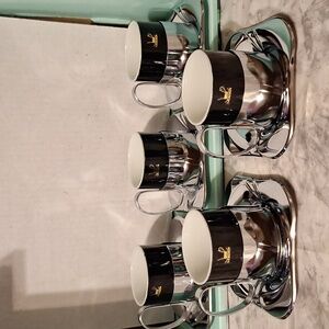 5 Leader saucers with cups